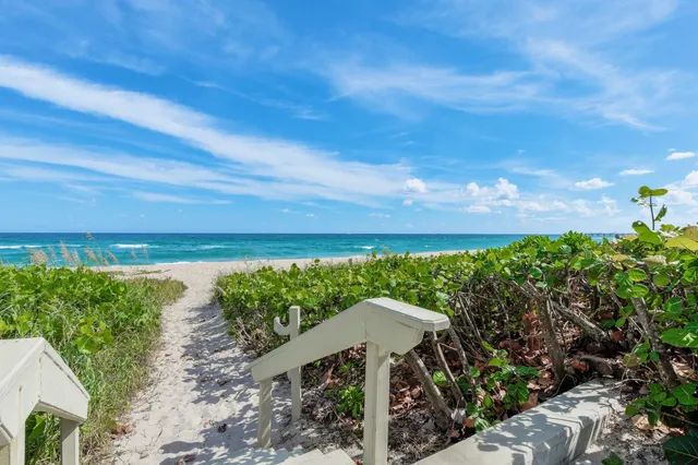 a view of a balcony with street sign