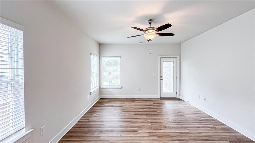 740 Eudora Welty Way Athens, GA 30607 - Photo 35 of 57 a view of empty room with wooden floor and fan