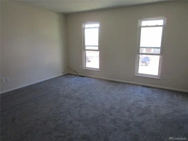an empty room with a window