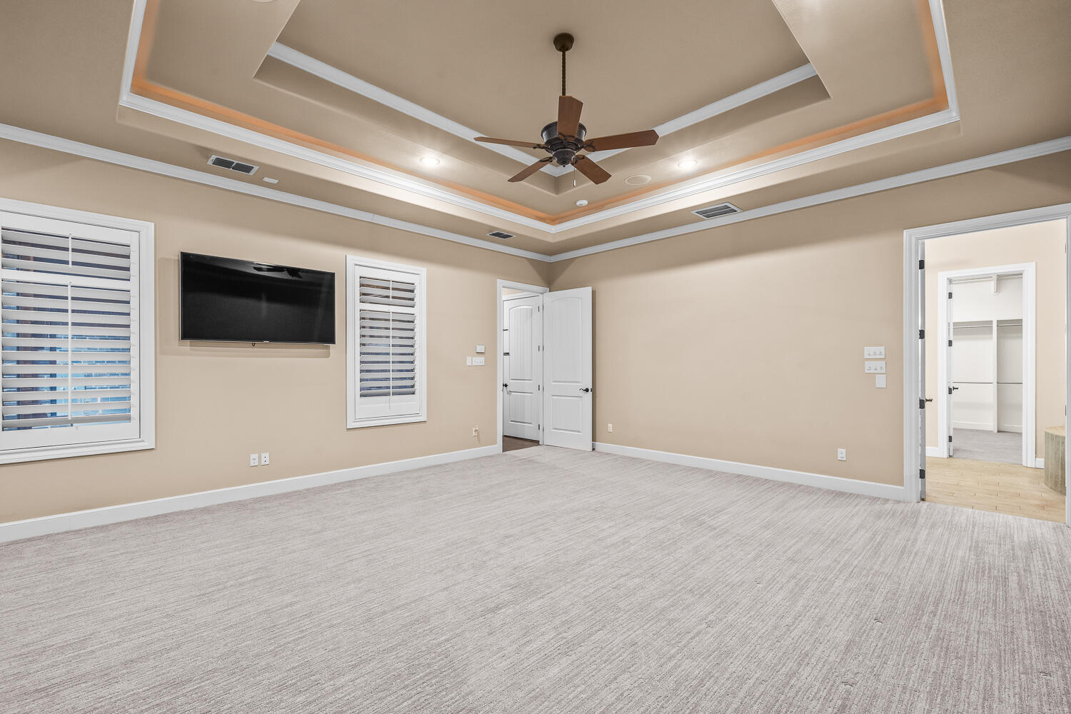 4509 103rd Street Lubbock, TX 79424 - Photo 26 of 94 a view of an empty room with a window and a ceiling fan
