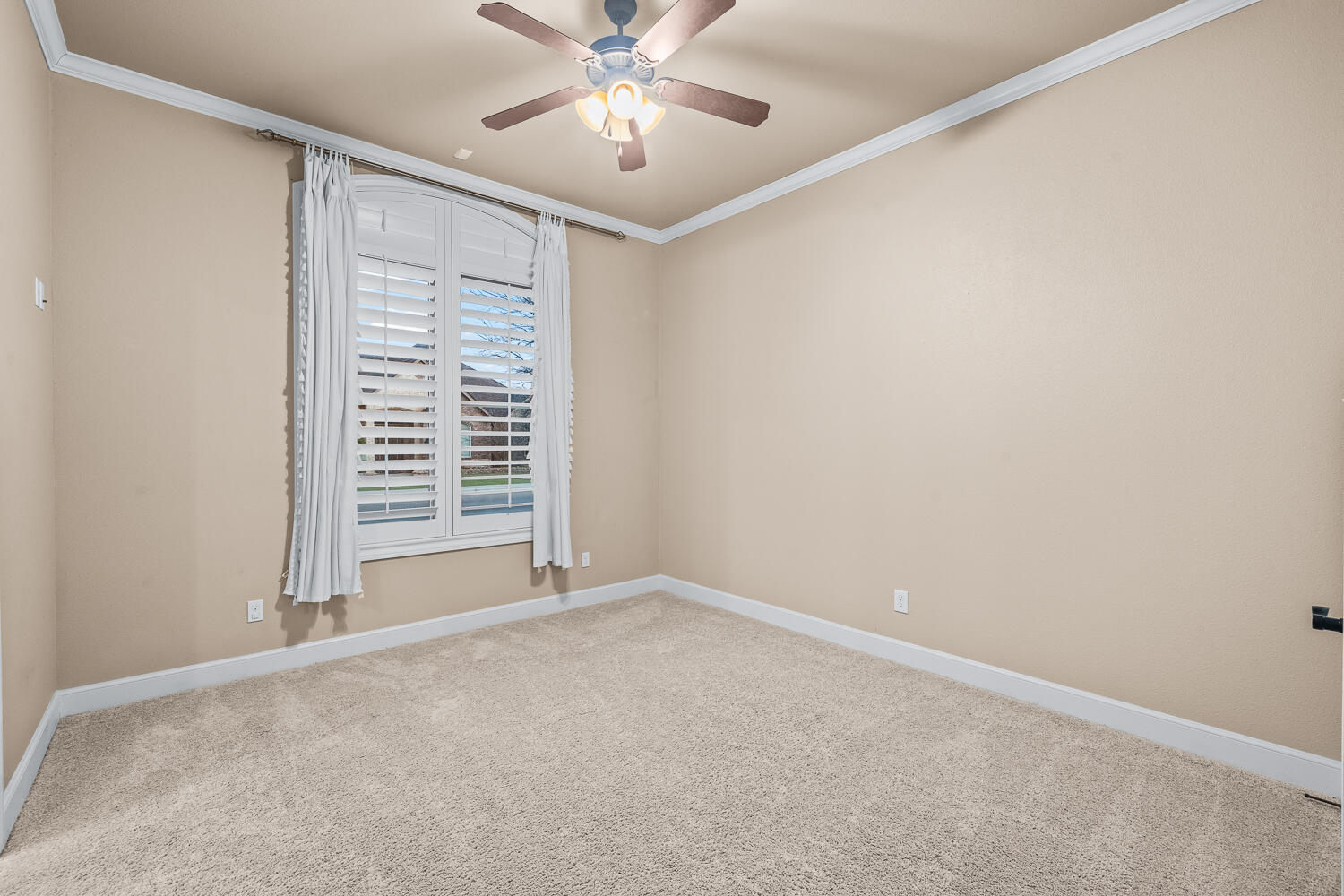 4509 103rd Street Lubbock, TX 79424 - Photo 59 of 94 a view of an empty room with a window