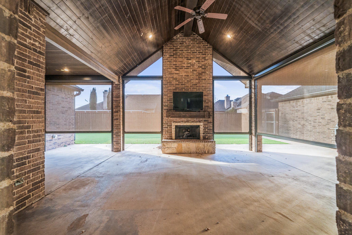 4509 103rd Street Lubbock, TX 79424 - Photo 79 of 94 a view of an empty room with a fireplace and window