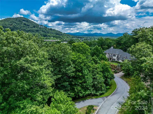 a view of a house with a big yard