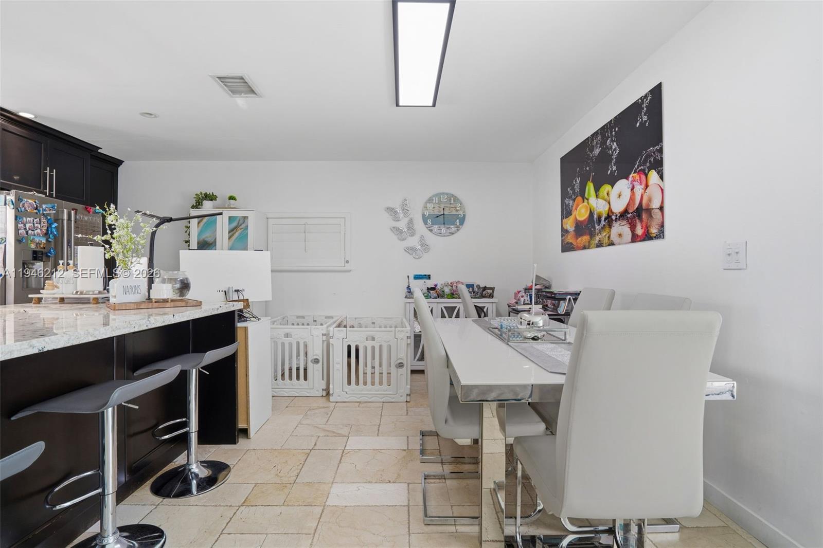 4335 Southwest 98th Court Miami, FL 33165 - Photo 12 of 38 a view of a kitchen area with furniture and window