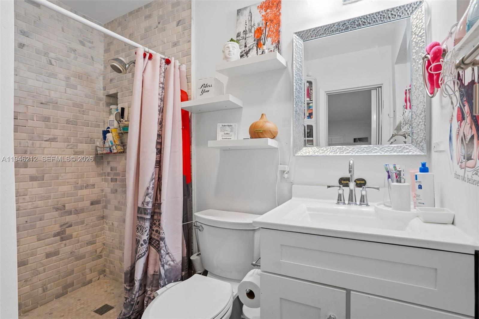 4335 Southwest 98th Court Miami, FL 33165 - Photo 25 of 38 a bathroom with a sink toilet and shower