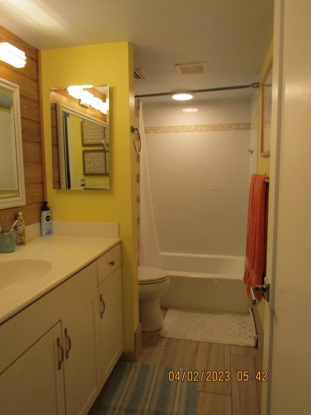 1456 Northeast Ocean Boulevard, Unit 2202 Stuart, FL 34996 - Photo 16 of 20 a bathroom with a sink a toilet and shower