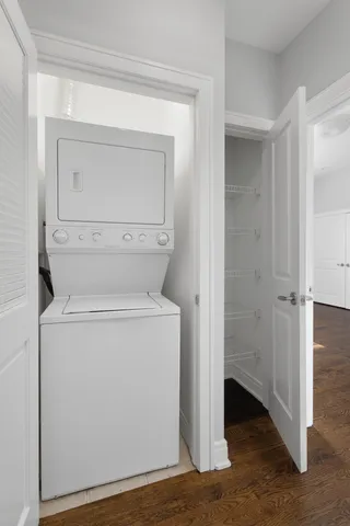 a view of storage and utility room with washer and dryer