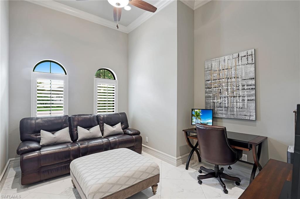 16459 Seneca Way Naples, FL 34110 - Photo 30 of 50 a work room with furniture and a window