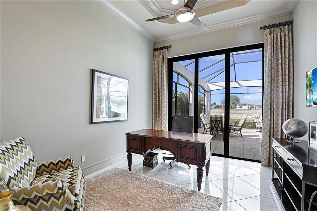 16459 Seneca Way Naples, FL 34110 - Photo 31 of 50 a living room with furniture and a window