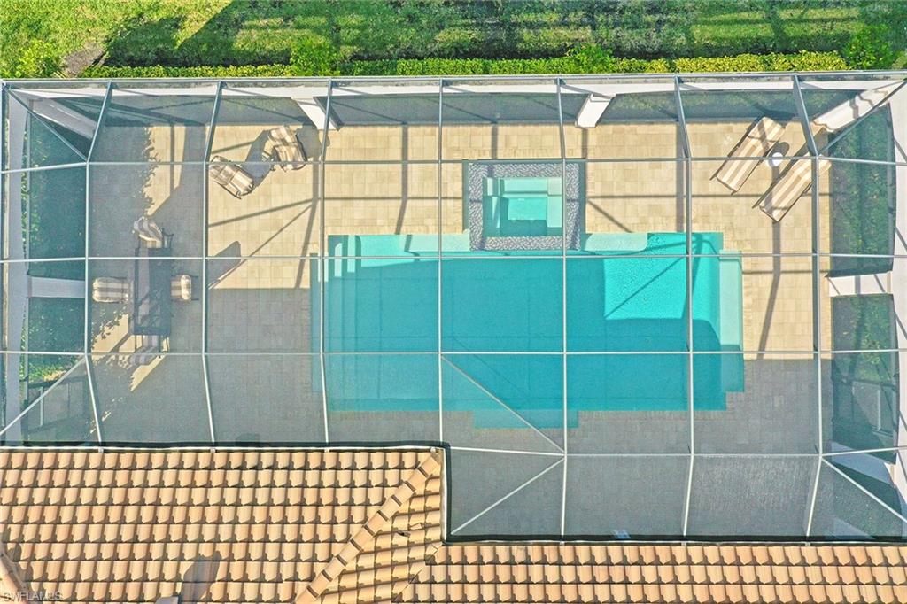 16459 Seneca Way Naples, FL 34110 - Photo 36 of 50 a bathroom with a shower