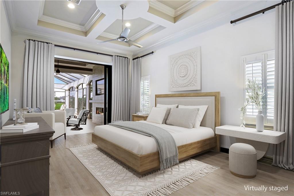 16459 Seneca Way Naples, FL 34110 - Photo 6 of 50 a spacious bedroom with a large bed and a window