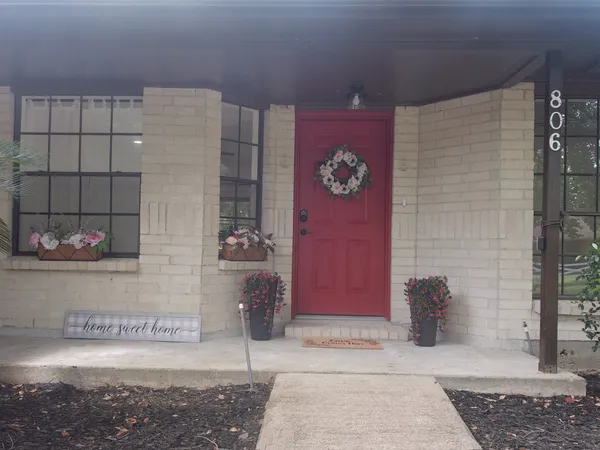 a view of a door and a outdoor space