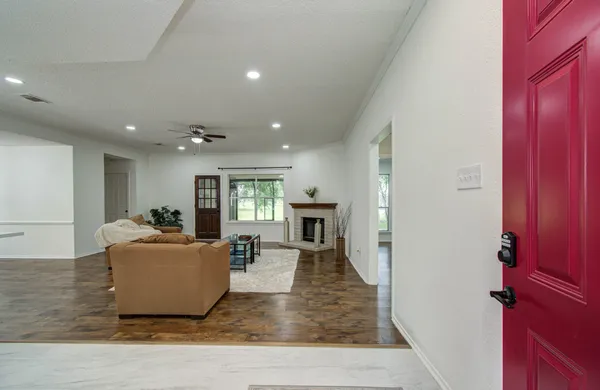 a living room with furniture and a table