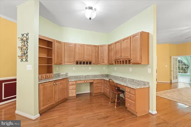a view of a storage & utility room with two washing machine