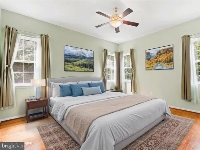 a bathroom with a sink toilet and a mirror