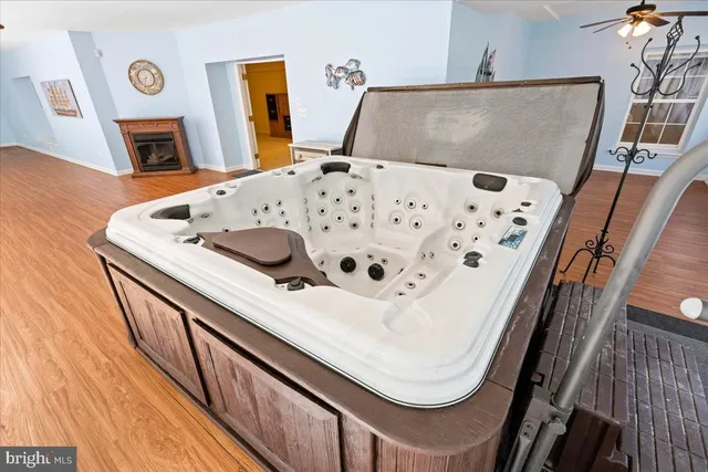 a view of an empty room with a kitchen