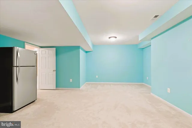 a view of a park with large trees