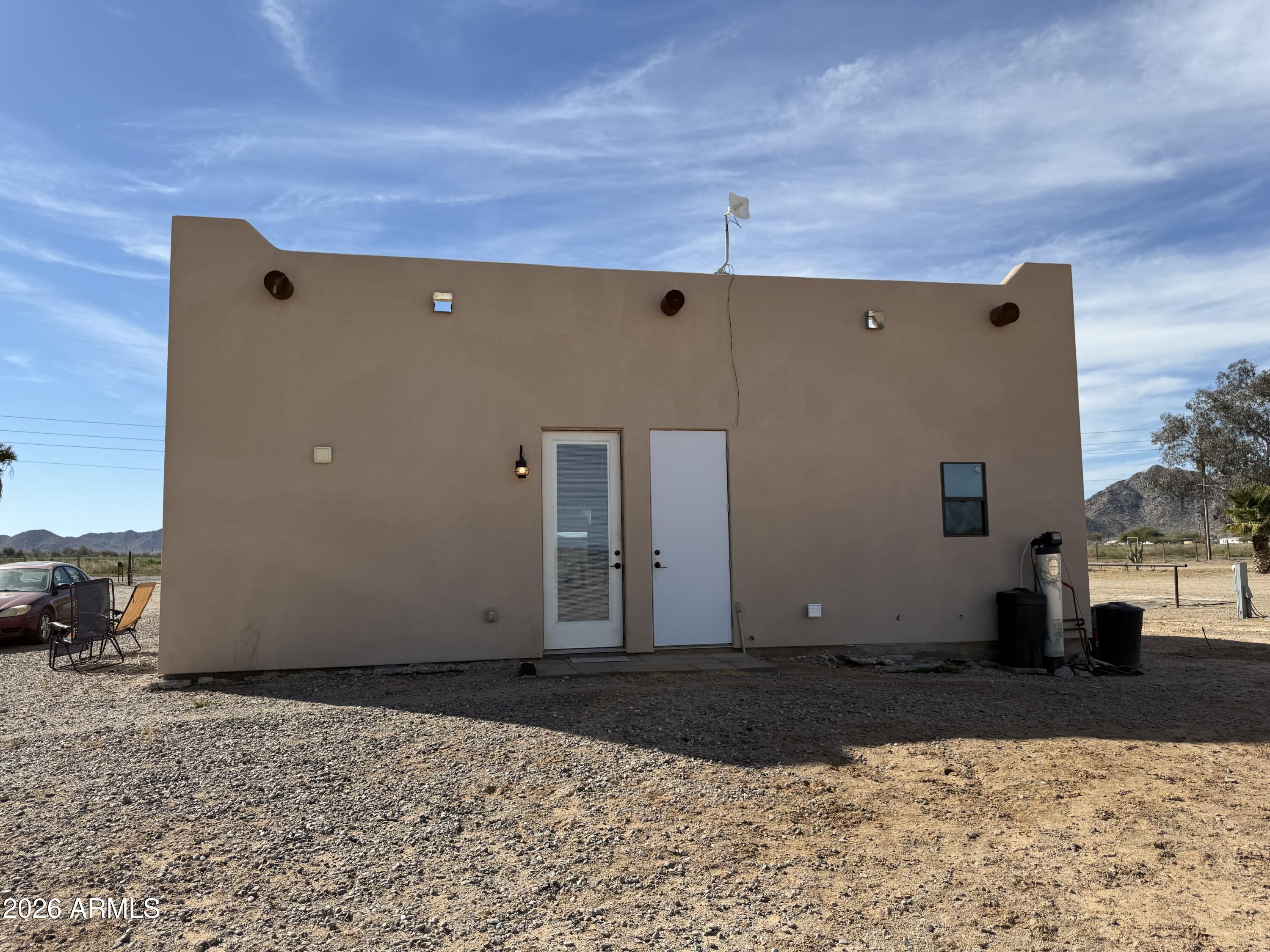 10545 North Ralston Road Maricopa, AZ 85139 - Photo 17 of 27 a view of a house with a yard