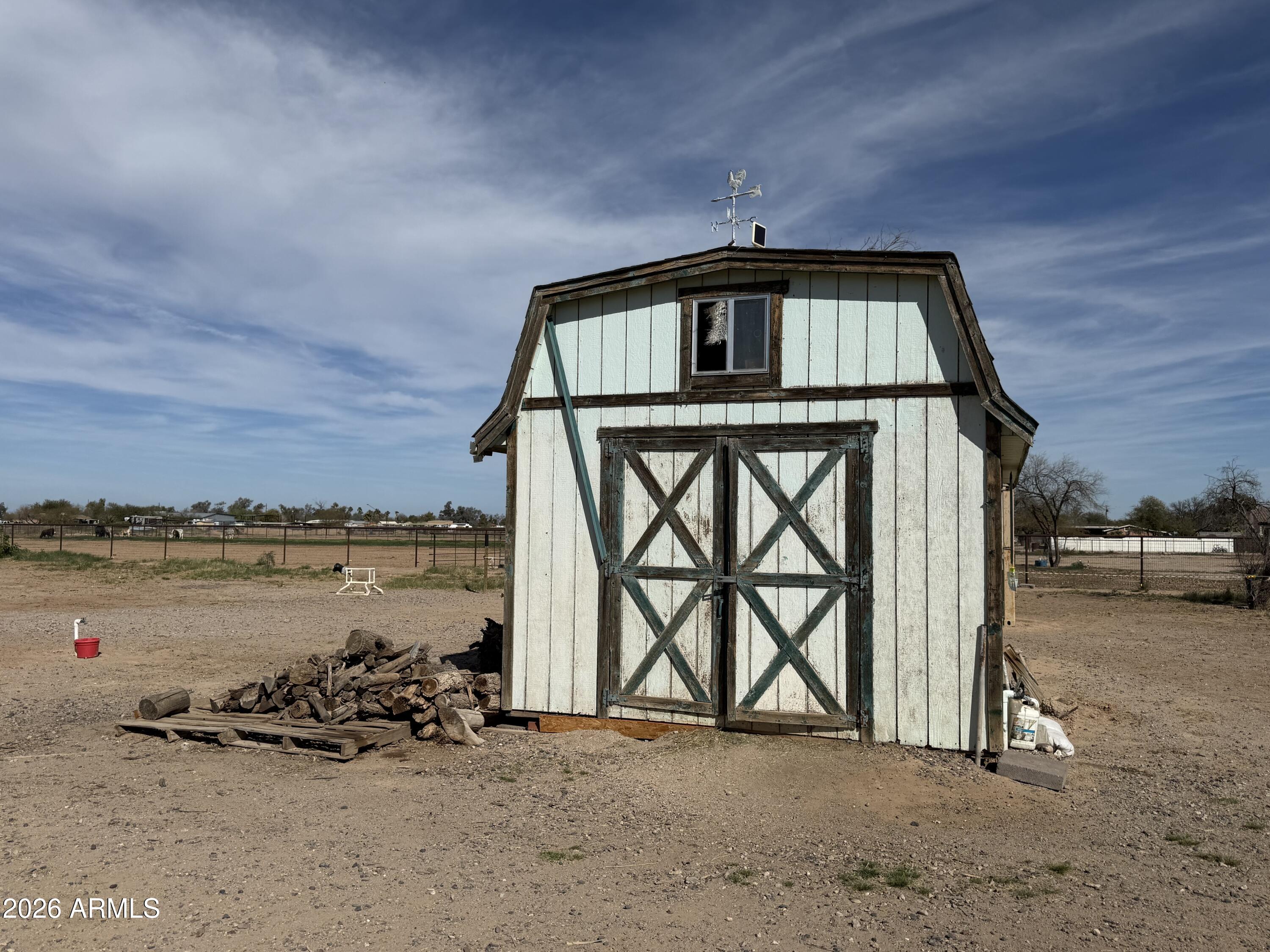 10545 North Ralston Road Maricopa, AZ 85139 - Photo 19 of 27 a front view of a house with balcony