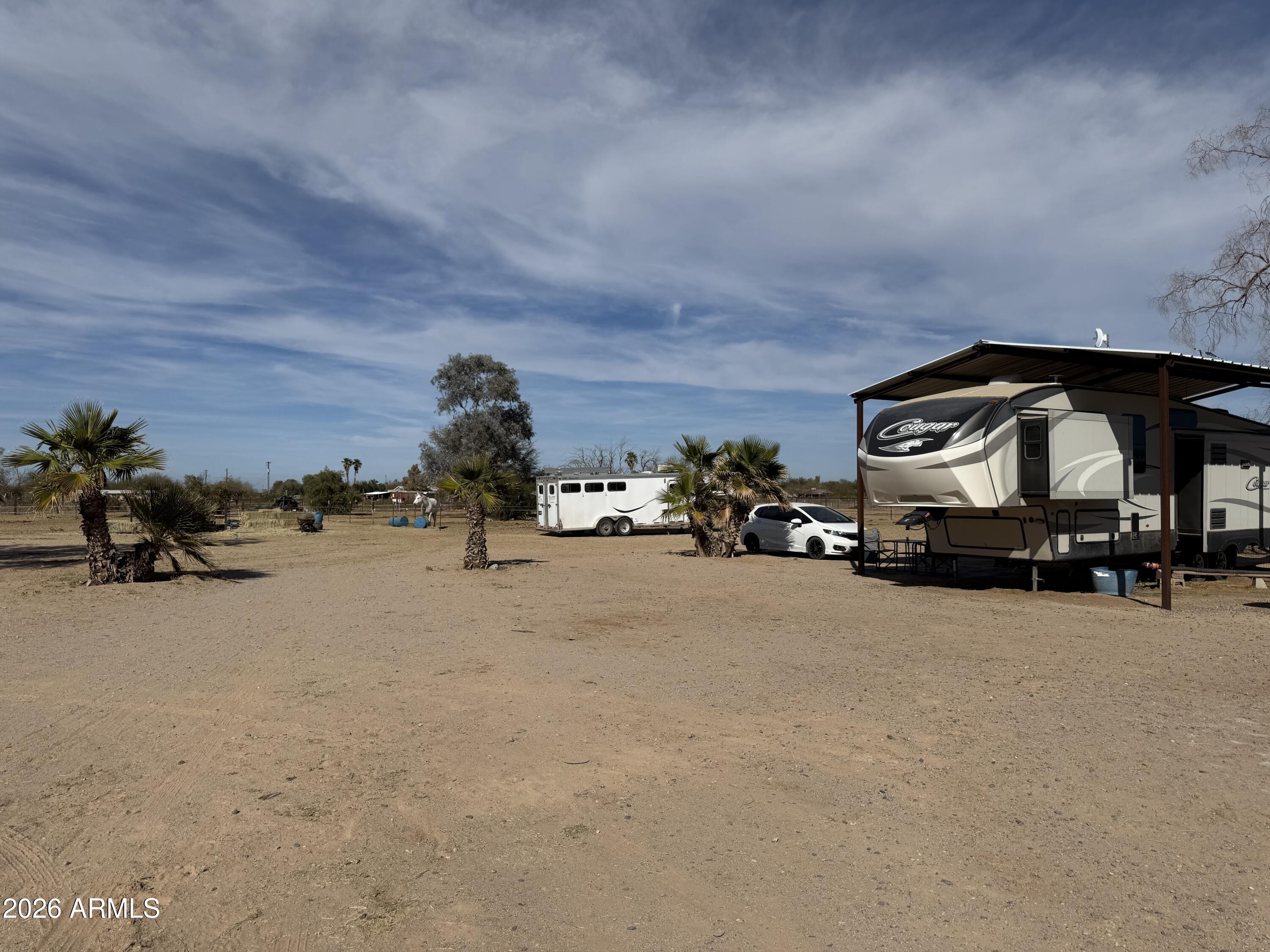 10545 North Ralston Road Maricopa, AZ 85139 - Photo 23 of 27 a view of car parked in front of house