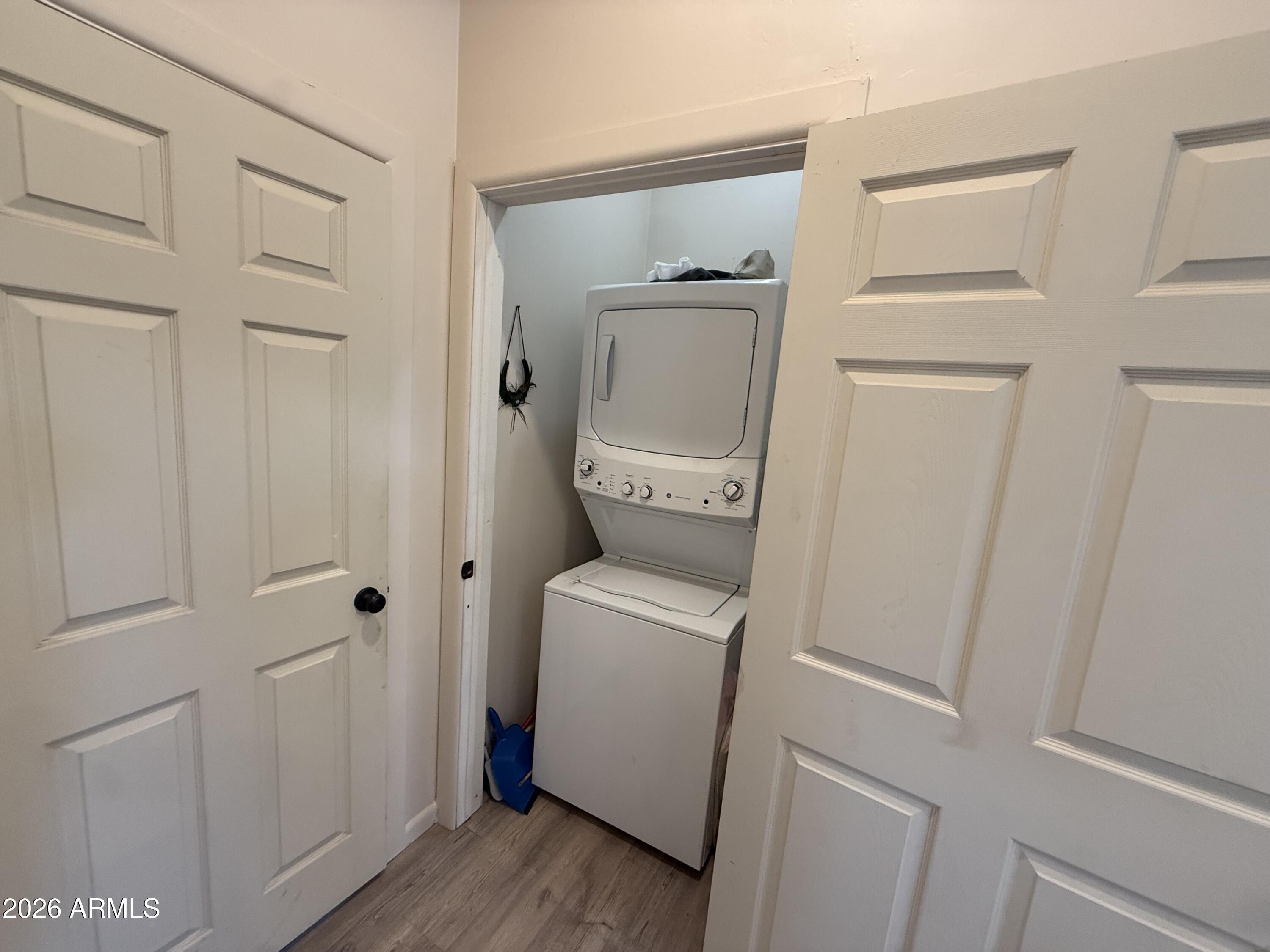 10545 North Ralston Road Maricopa, AZ 85139 - Photo 9 of 27 a utility room with dryer and washer