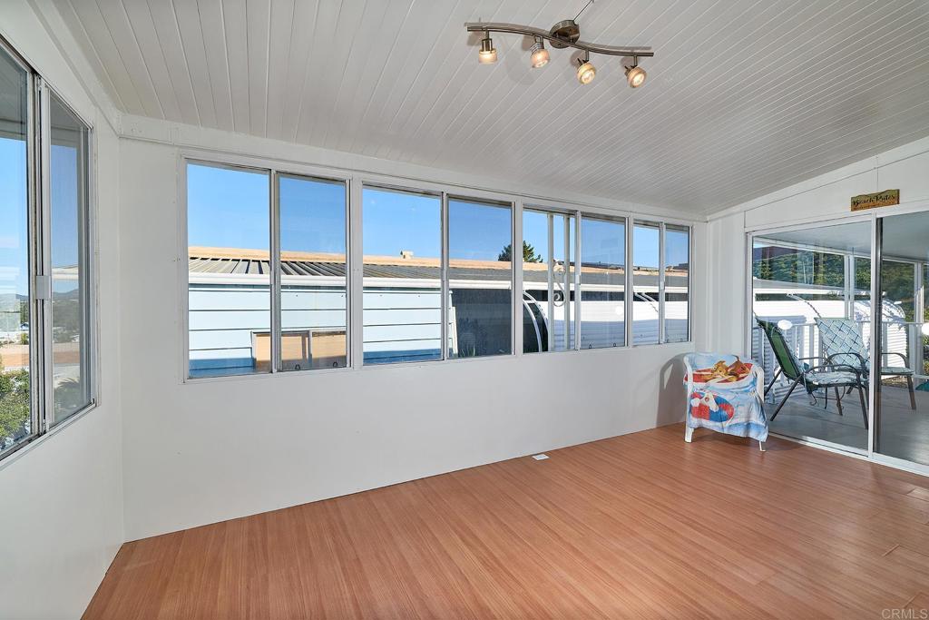 1195 La Moree Road, Unit SPC 42 San Marcos, CA 92078 - Photo 18 of 52 a view of a kitchen with furniture and a window