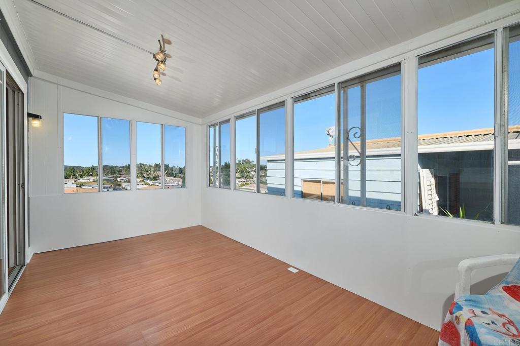 1195 La Moree Road, Unit SPC 42 San Marcos, CA 92078 - Photo 19 of 52 a view of a living room with a large window