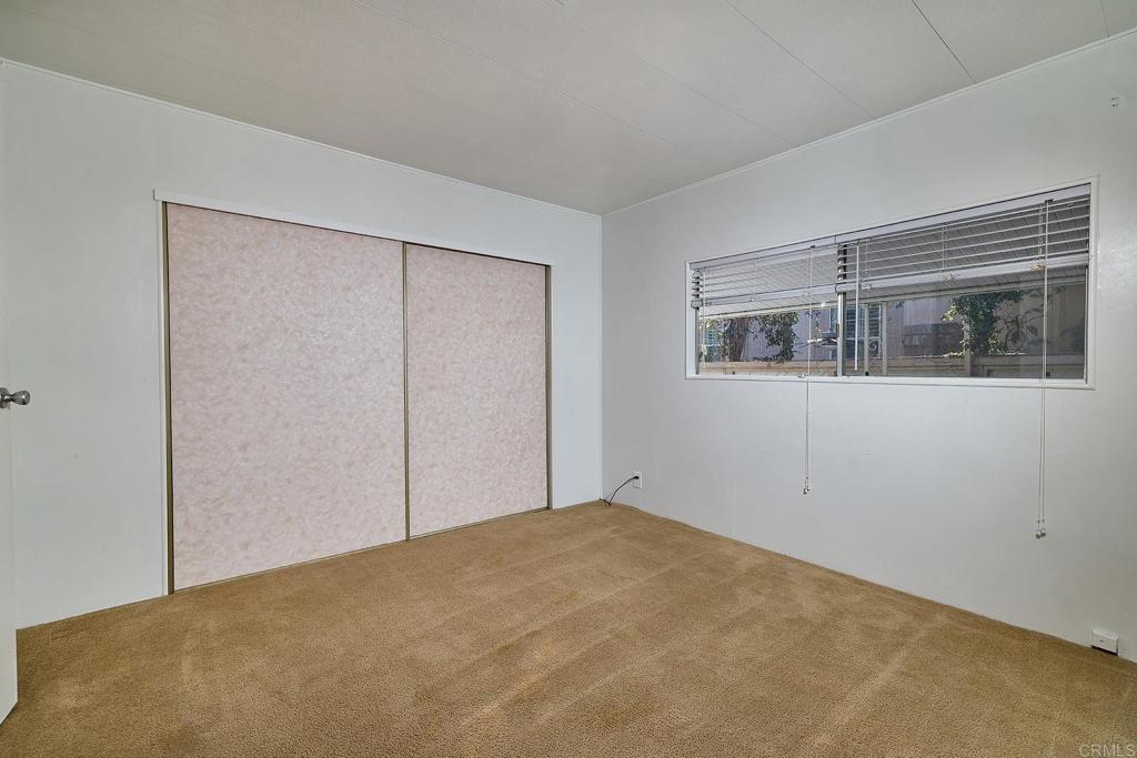 1195 La Moree Road, Unit SPC 42 San Marcos, CA 92078 - Photo 24 of 52 a view of an empty room with a window
