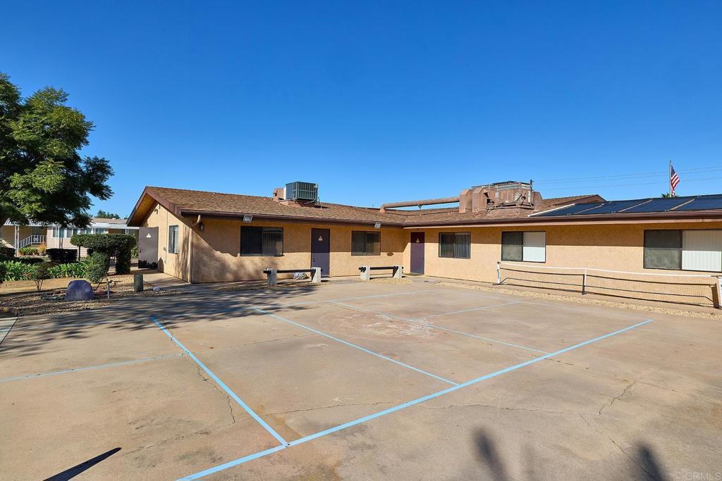 1195 La Moree Road, Unit SPC 42 San Marcos, CA 92078 - Photo 27 of 52 a front view of a house with a garage