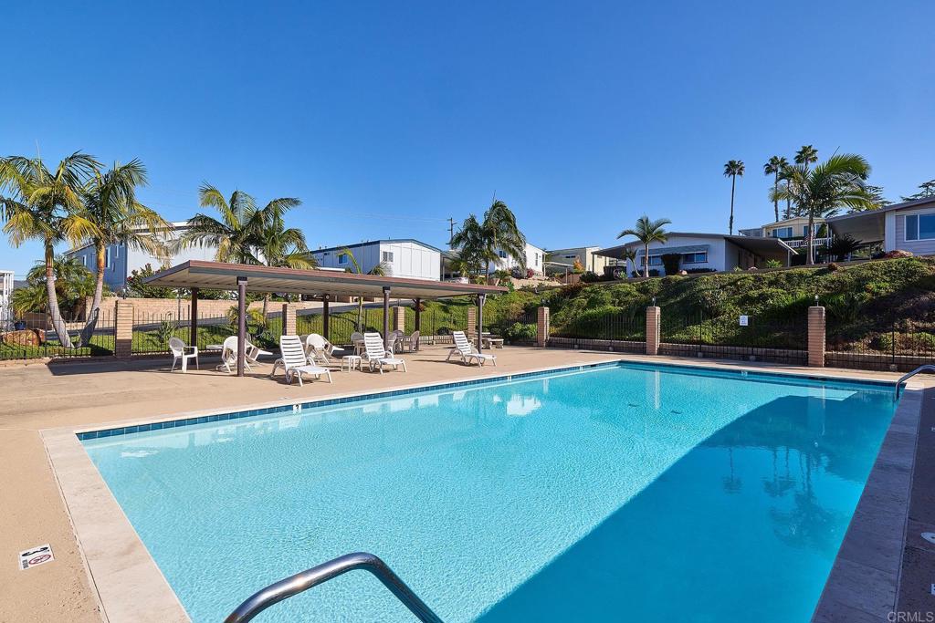 1195 La Moree Road, Unit SPC 42 San Marcos, CA 92078 - Photo 37 of 52 a view of a swimming pool and a terrace