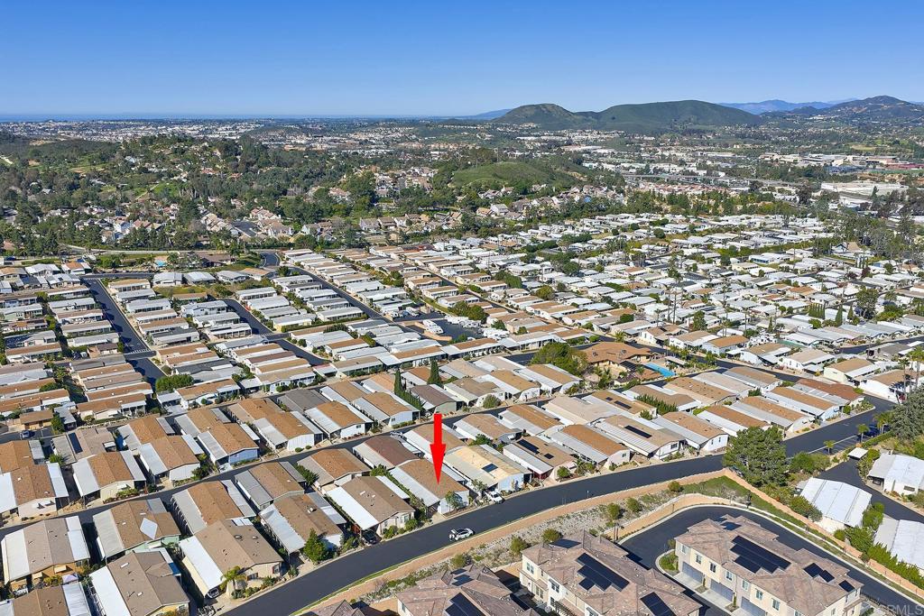 1195 La Moree Road, Unit SPC 42 San Marcos, CA 92078 - Photo 43 of 52 an aerial view of residential houses with city view