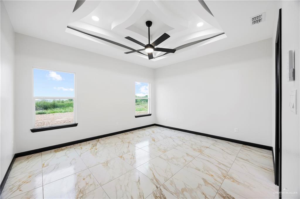 7 John Street Rio Grande City, TX 78582 - Photo 8 of 17 a view of an empty room with a window