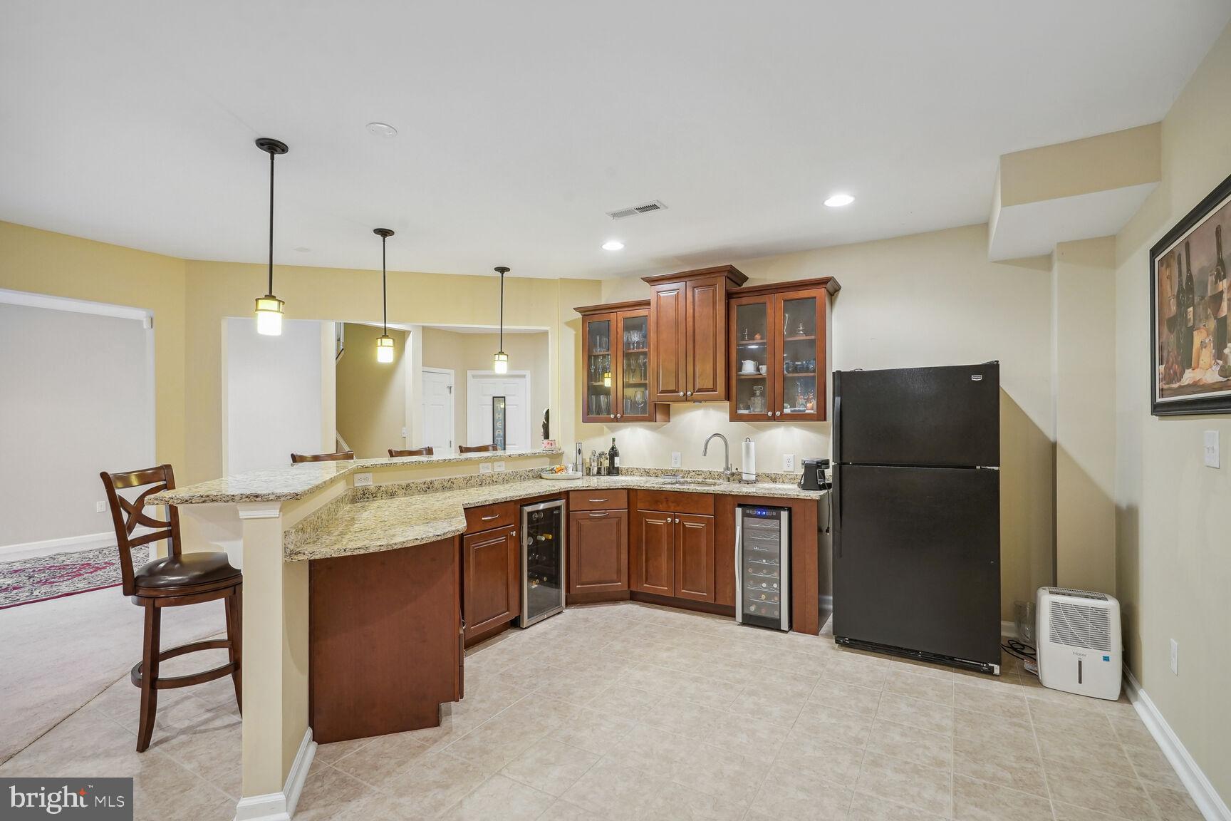 9323 Castle Hill Road Springfield, VA 22153 - Photo 40 of 66 Wet Bar w/Wine Coolers