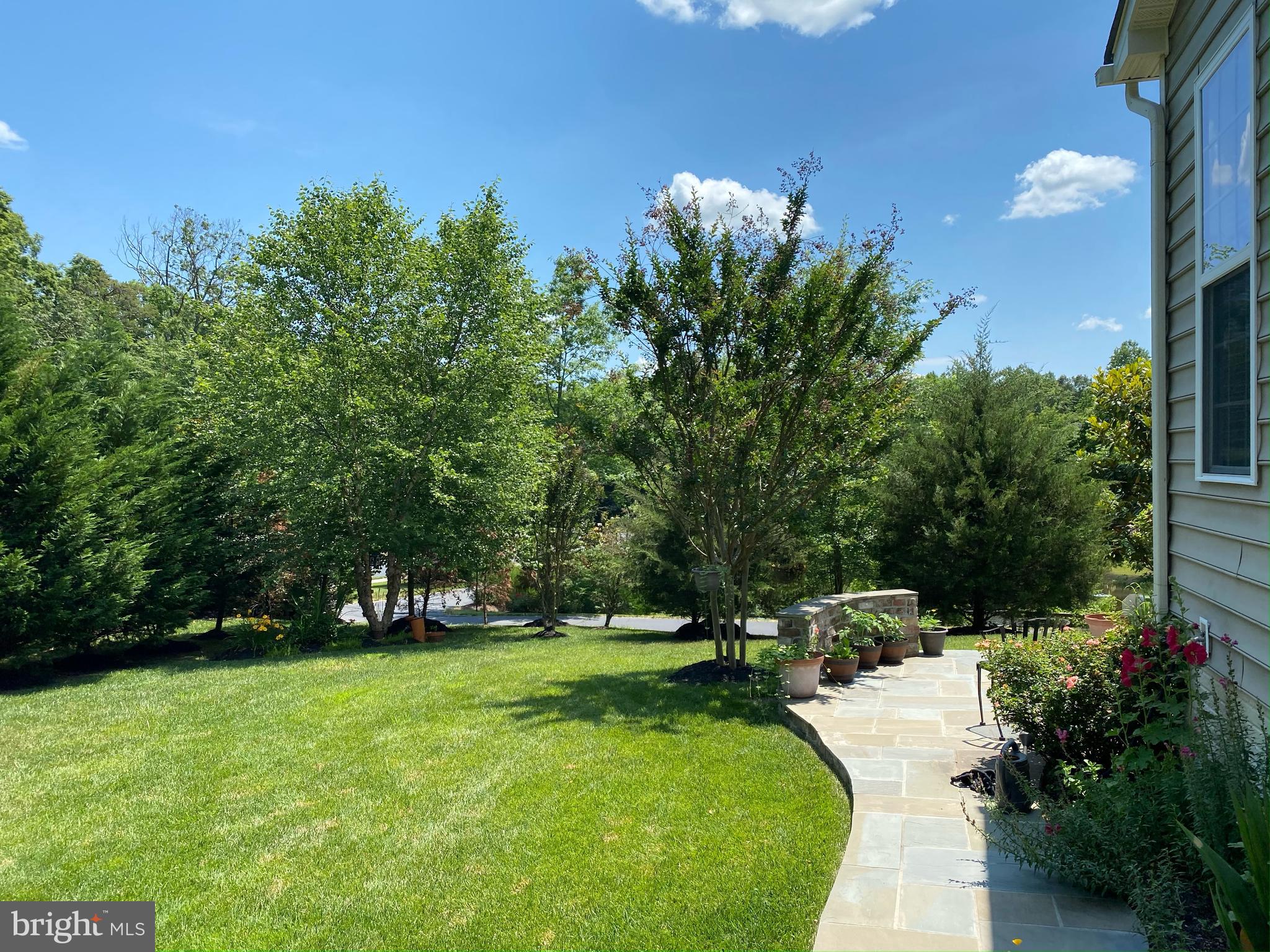 9323 Castle Hill Road Springfield, VA 22153 - Photo 54 of 66 Paved Path round fountain pond leads to School Bus