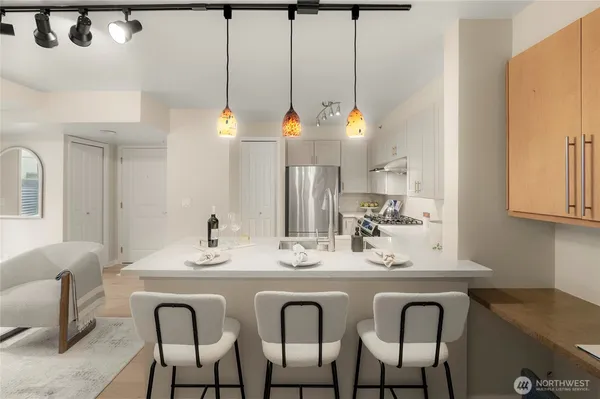 a dining room with furniture and window