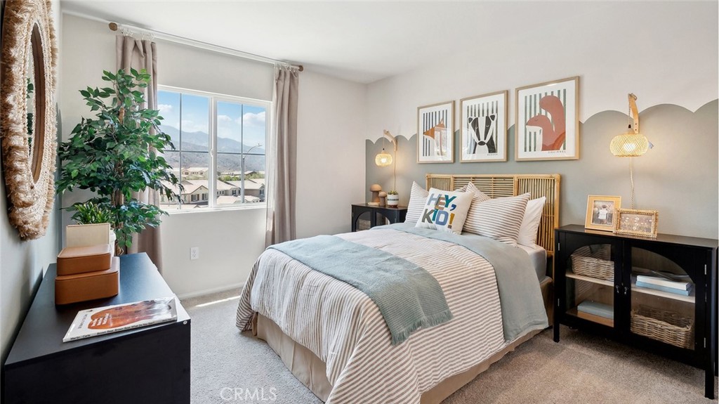 11392 Forge Road Corona, CA 92883 - Photo 20 of 24 a bedroom with a bed and a night stand