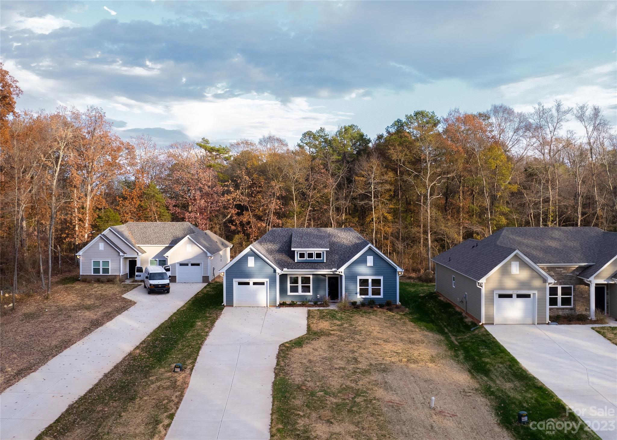 2113 Tom Sadler Road Charlotte, NC 28214 - Photo 1 of 31 a front view of a house with a garden