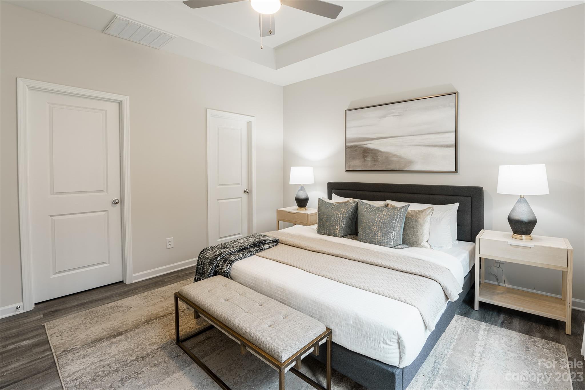 2113 Tom Sadler Road Charlotte, NC 28214 - Photo 16 of 31 a bedroom with bed and wooden floor
