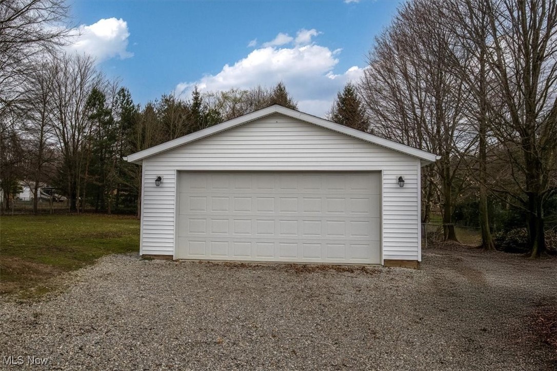 3831 Cook Road Rootstown, OH 44272 - Photo 4 of 25 Detached garage holds 2 cars and allows extra space at 24' wide x 32' deep with 10' ceiling.