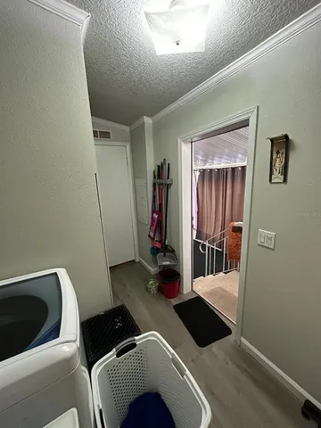 a room with furniture and a ceiling fan