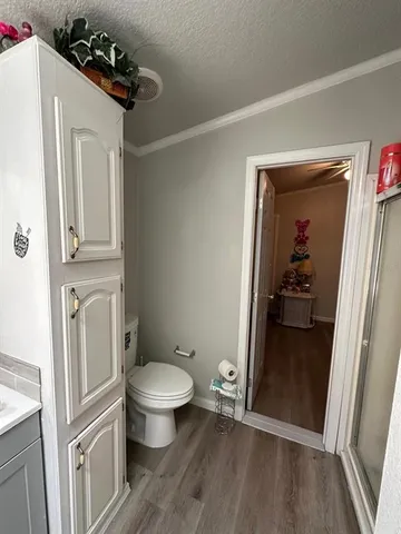 a bathroom with a sink and toilet