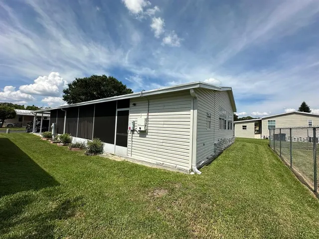 a view of a backyard with a garden