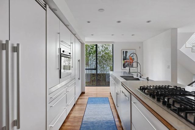 a view of a living room and dining room