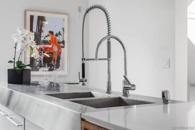 a bathroom with a sink and mirror