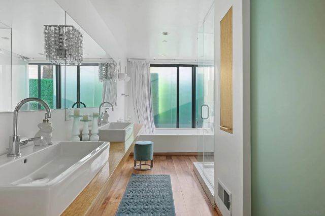 a view of bathroom with dual sinks