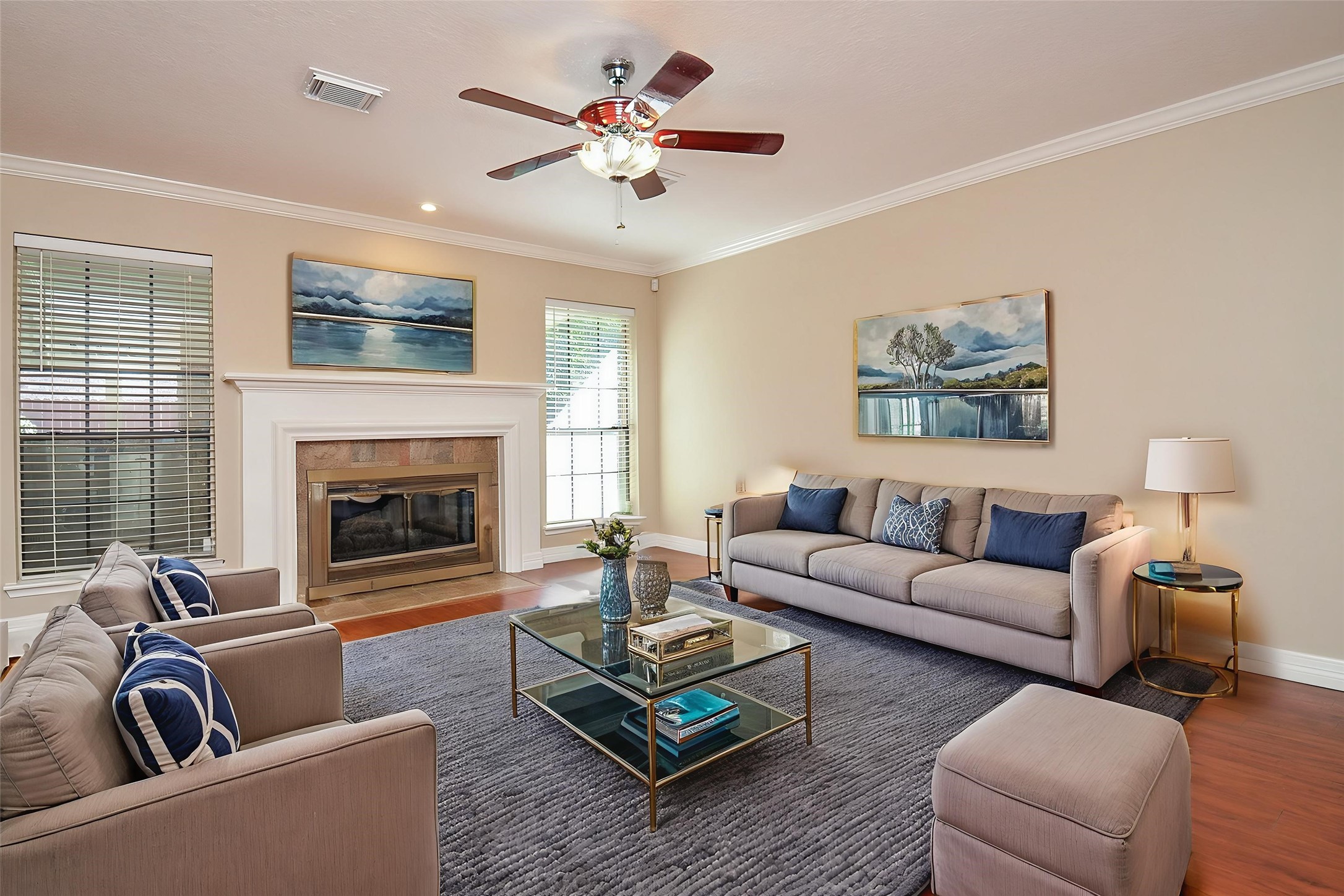 8803 Tweedbrook Drive Spring, TX 77379 - Photo 10 of 36 Welcome to this gorgeous main living space. Notice the beautiful fireplace that serves as a focal point of the home.