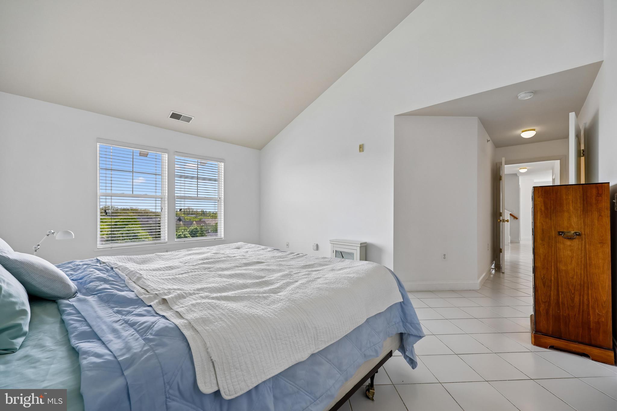 12824 Clarksburg Square Road, Unit 403 Clarksburg, MD 20871 - Photo 11 of 38 Primary ensuite bedroom and bath