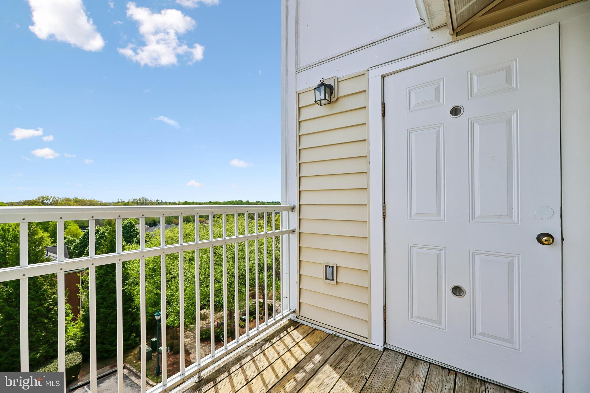 12824 Clarksburg Square Road, Unit 403 Clarksburg, MD 20871 - Photo 25 of 38 Balcony w/access to water heater and extra storage