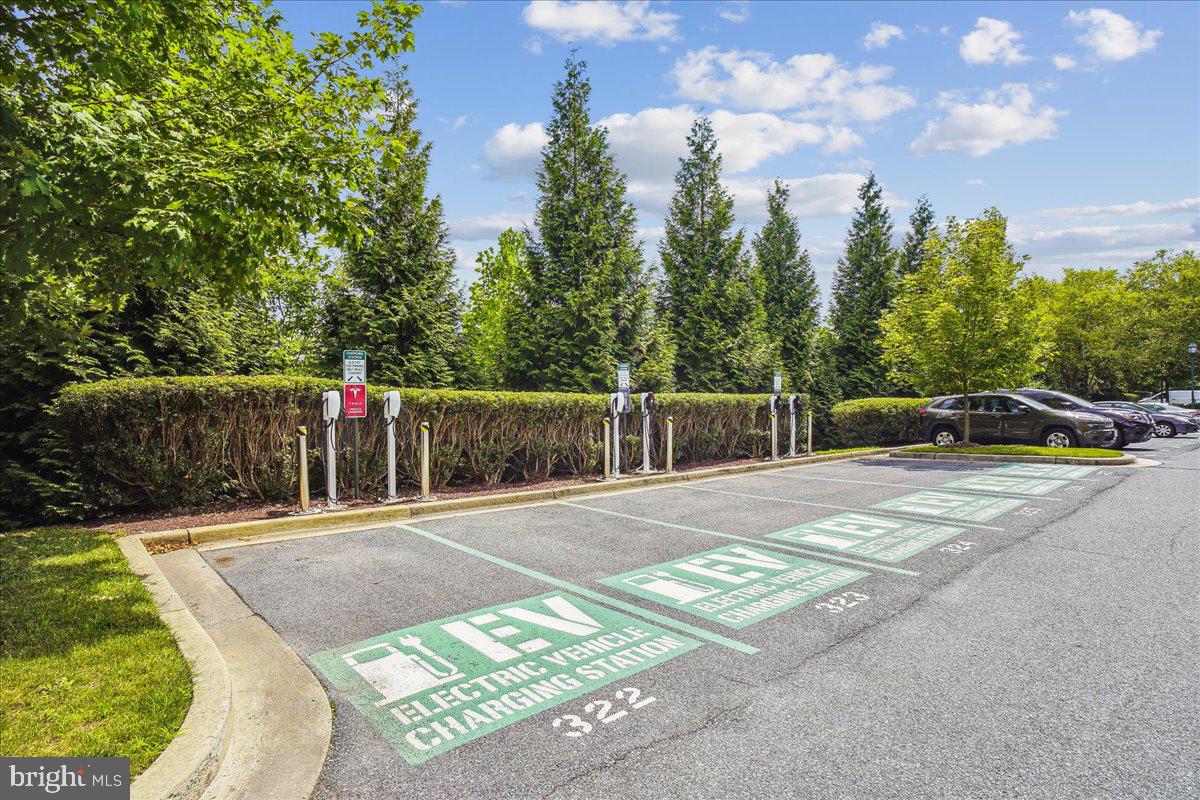 12824 Clarksburg Square Road, Unit 403 Clarksburg, MD 20871 - Photo 28 of 38 EV chargers around the corner from the garage