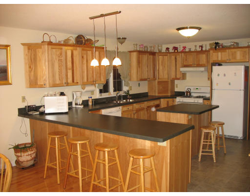 178 Upper Hampden Road Monson, MA 01057 - Photo 7 of 18 a kitchen with a sink and cabinets